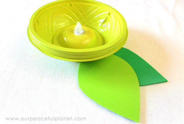 Check out this "Berry" Amazing and Easy DIY Room Decor Light made from a small plastic cherub tomato container. A brilliant upcycle project for all ages!
