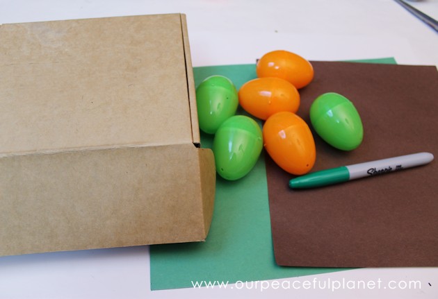 Make this cute carrot garden diy Easter basket using plastic eggs, a box and some construction paper! You can fill the box and the carrot eggs with goodies.