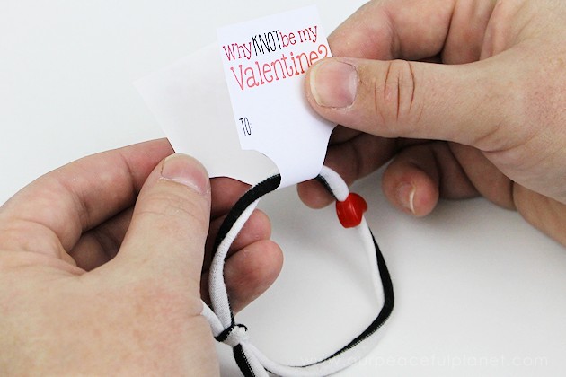 You got 3 minutes? Got an old t-shirt? Add in heart shaped pony beads and now you've got 3 minute DIY bracelets! Great for Valentine's Day! (Free tags.)