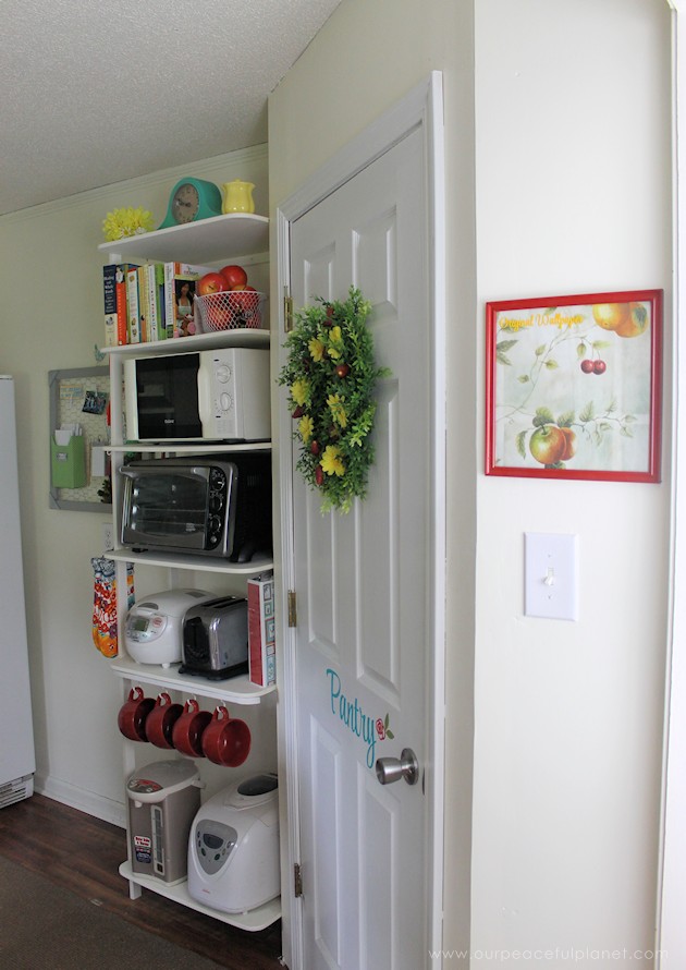 See the final reveal of our outdated kitchen transformation, completed with a minimum of cash. It's now a fun, inspiring place to be. Before & after photos!