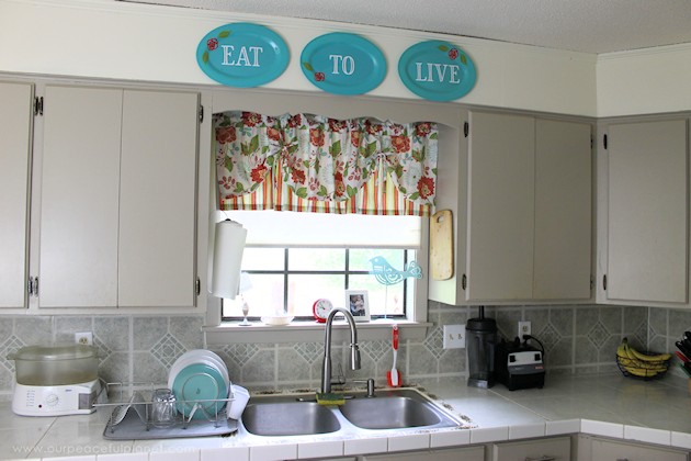 See the final reveal of our outdated kitchen transformation, completed with a minimum of cash. It's now a fun, inspiring place to be. Before & after photos!
