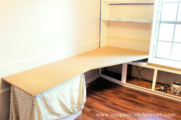 Build a large surface home office desk from inexpensive 3/4" MDF wood. Using items you might already have, no legs are needed. It's easier than you think!