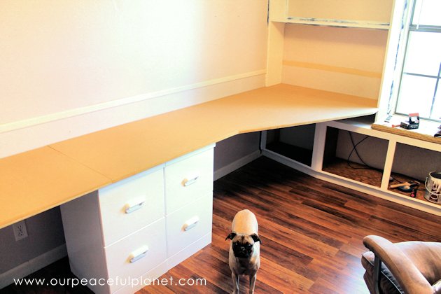 Build a large surface home office desk from inexpensive 3/4" MDF wood. Using items you might already have, no legs are needed. It's easier than you think!