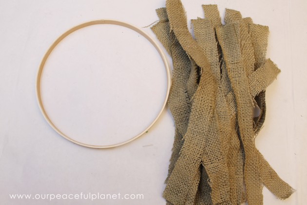 Quickly & inexpensively decorate your door or walls with this burlap wreath! All you need is a little burlap material & one side of an 8" embroidery hoop.