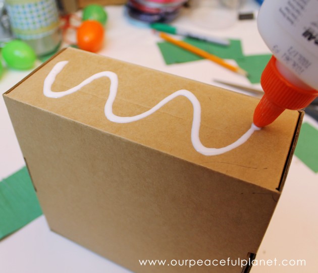 Make this cute carrot garden diy Easter basket using plastic eggs, a box and some construction paper! You can fill the box and the carrot eggs with goodies.