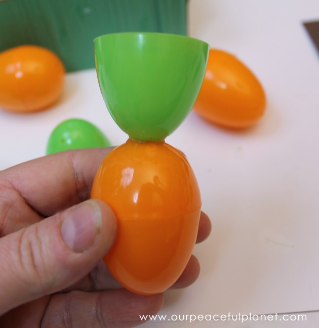 Make this cute carrot garden diy Easter basket using plastic eggs, a box and some construction paper! You can fill the box and the carrot eggs with goodies.