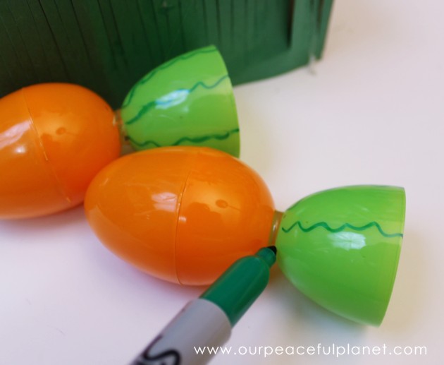 Make this cute carrot garden diy Easter basket using plastic eggs, a box and some construction paper! You can fill the box and the carrot eggs with goodies.