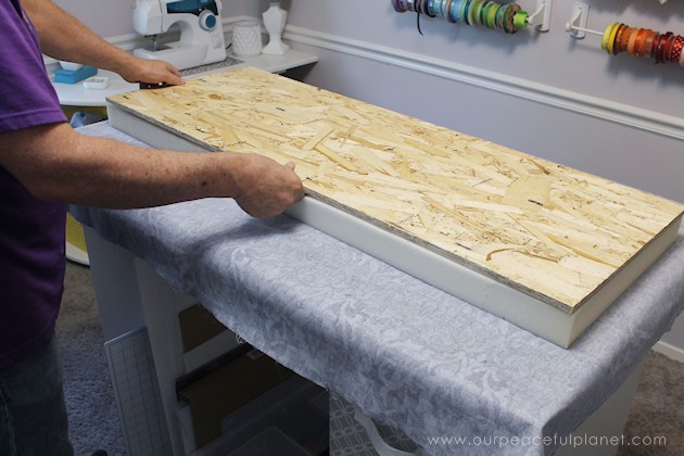 Turn a cedar chest into a window seat by making a removable DIY bench seat for it that attaches with no nails or screws. Also for pets to look out windows.