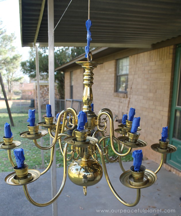A simple chandelier makeover using a chandelier found at a thrift store. It replaced a ceiling fan in and was flush mounted. The effect was stunning!