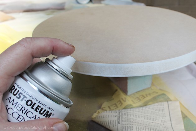 This cheap folding stool from Amazon was for my craft room. It just needed a little love. i.e. paint and material plus a wood circle to make it tad higher. I also added the feature of making the fabric top removable in case I want to change the color at some point.