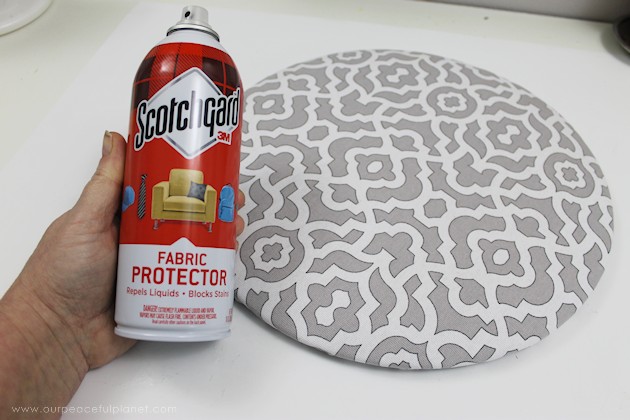 This cheap folding stool from Amazon was for my craft room. It just needed a little love. i.e. paint and material plus a wood circle to make it tad higher. I also added the feature of making the fabric top removable in case I want to change the color at some point.