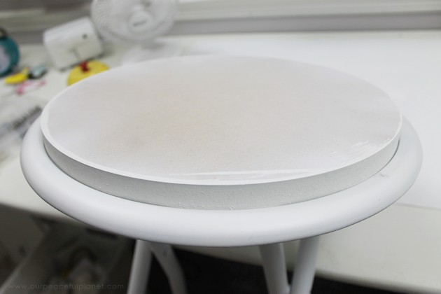 This cheap folding stool from Amazon was for my craft room. It just needed a little love. i.e. paint and material plus a wood circle to make it tad higher. I also added the feature of making the fabric top removable in case I want to change the color at some point.