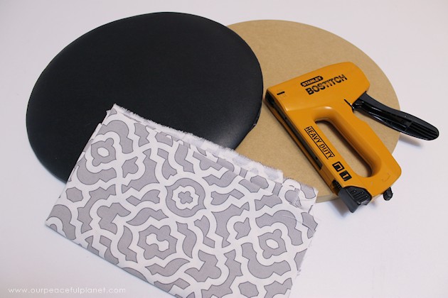 This cheap folding stool from Amazon was for my craft room. It just needed a little love. i.e. paint and material plus a wood circle to make it tad higher. I also added the feature of making the fabric top removable in case I want to change the color at some point.