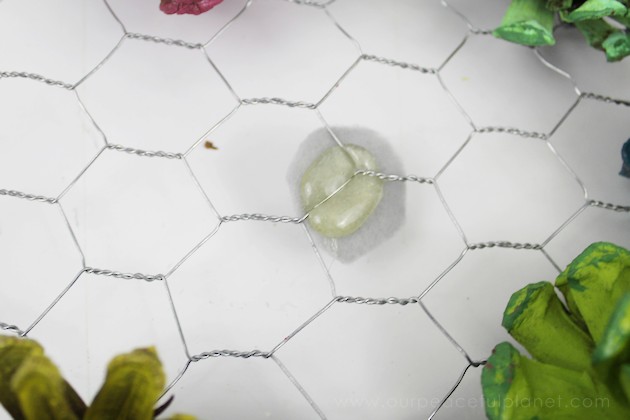 A country chicken wire frame memo board that will brighten up your kitchen with its pretty pinecone succulents. It holds useful items plus photos & quotes!