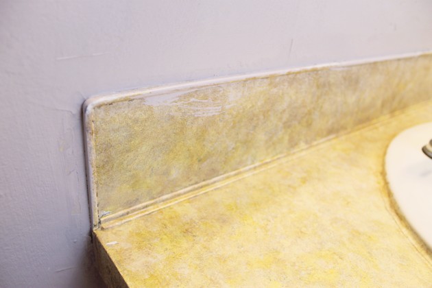 Transform your bathroom for only a few dollars with a contact paper countertop. You'll be amazed at how beautiful it looks & so will your family & guests!