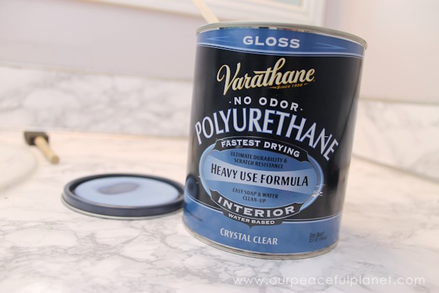 Transform your bathroom for only a few dollars with a contact paper countertop. You'll be amazed at how beautiful it looks & so will your family & guests!