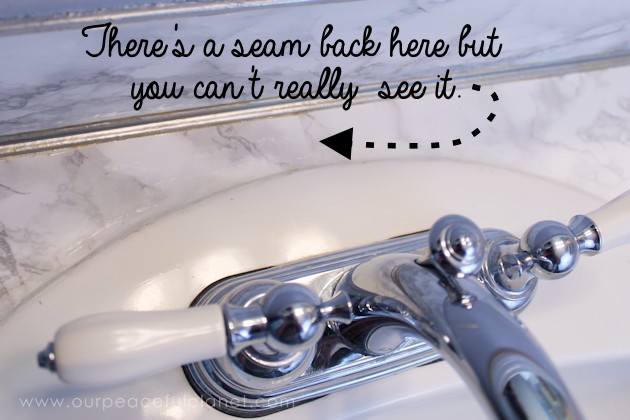 Transform your bathroom for only a few dollars with a contact paper countertop. You'll be amazed at how beautiful it looks & so will your family & guests!