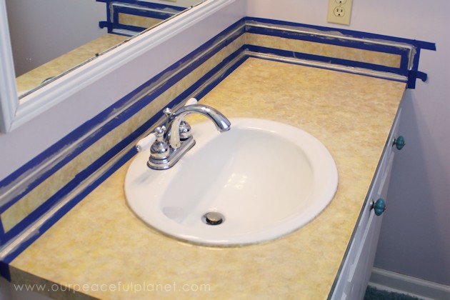 Transform your bathroom for only a few dollars with a contact paper countertop. You'll be amazed at how beautiful it looks & so will your family & guests!