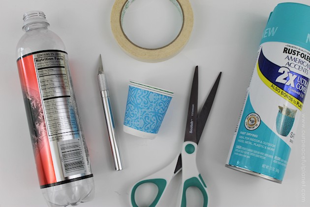 This cup dispenser is part of our matching Contemporary Kitchen Craft series. Hang it anywhere. It works and looks great! Best soda bottle upcycle ever!