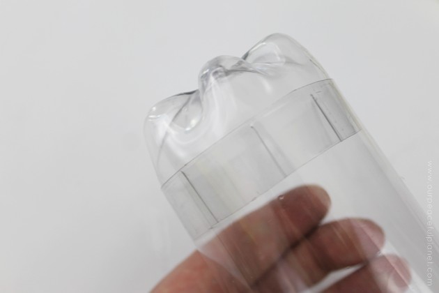 This cup dispenser is part of our matching Contemporary Kitchen Craft series. Hang it anywhere. It works and looks great! Best soda bottle upcycle ever!