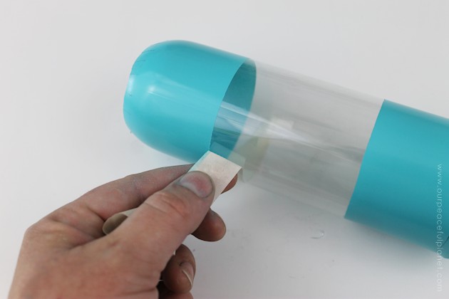This cup dispenser is part of our matching Contemporary Kitchen Craft series. Hang it anywhere. It works and looks great! Best soda bottle upcycle ever!