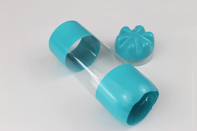 This cup dispenser is part of our matching Contemporary Kitchen Craft series. Hang it anywhere. It works and looks great! Best soda bottle upcycle ever!