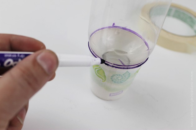 This cup dispenser is part of our matching Contemporary Kitchen Craft series. Hang it anywhere. It works and looks great! Best soda bottle upcycle ever!