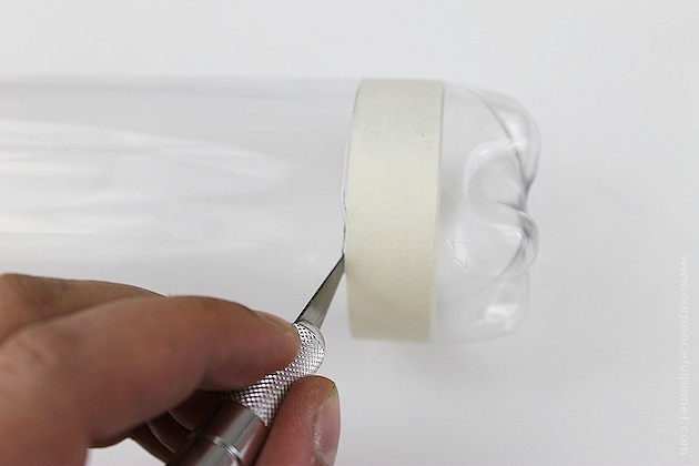 This cup dispenser is part of our matching Contemporary Kitchen Craft series. Hang it anywhere. It works and looks great! Best soda bottle upcycle ever!