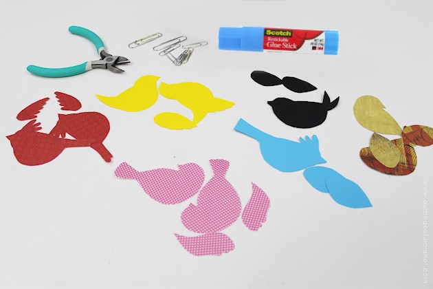 These sweet little birdies are perfect for a touch of whimsy DIY room decor and they can be placed in any room you like! Sit them on shelves, mantles, on top of books... you can even put a row on top of a door jam! Using our pattern you can make whatever colors you like. All you need is the paper of your choice and two paperclips and glue.