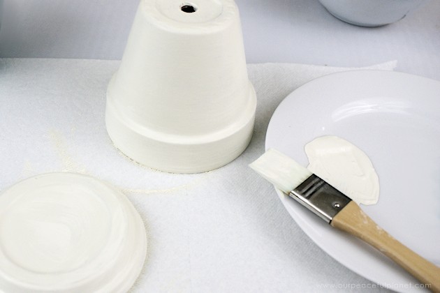 This elegant DIY sugar dispenser will add some beauty to your kitchen. It's made from a clay pot and a glass bowl and is inexpensive and simple to create!