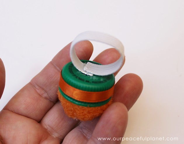 This tiny 10 minute pin cushion is a huge help for anyone who sews. Made using a lid from a plastic bottles you can make it any color or style you want!