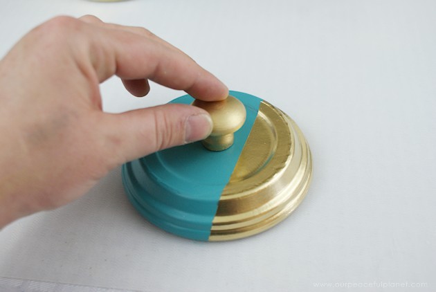A beautiful gold & teal version of the classic DIY gumball machine, made from a clay pot & a glass bowl. Use it for gum, candy or a variety of other things!