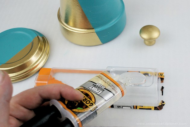A beautiful gold & teal version of the classic DIY gumball machine, made from a clay pot & a glass bowl. Use it for gum, candy or a variety of other things!