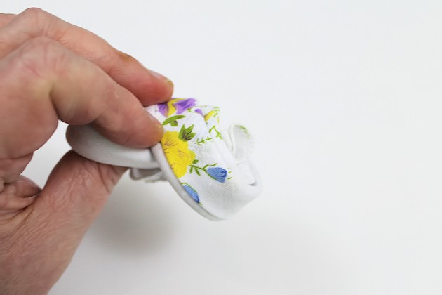 Give your friends a special Easter greetings bunny and beautiful poem made from a simple folded handkerchief or piece of cloth and filled with a golden egg.