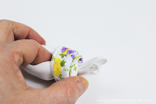 Give your friends a special Easter greetings bunny and beautiful poem made from a simple folded handkerchief or piece of cloth and filled with a golden egg.