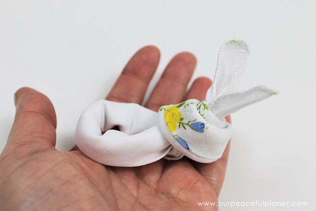 Give your friends a special Easter greetings bunny and beautiful poem made from a simple folded handkerchief or piece of cloth and filled with a golden egg.