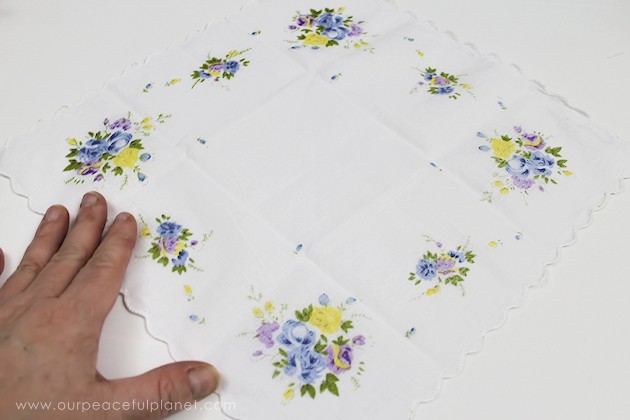 Give your friends a special Easter greetings bunny and beautiful poem made from a simple folded handkerchief or piece of cloth and filled with a golden egg.