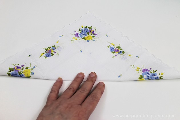 Give your friends a special Easter greetings bunny and beautiful poem made from a simple folded handkerchief or piece of cloth and filled with a golden egg.