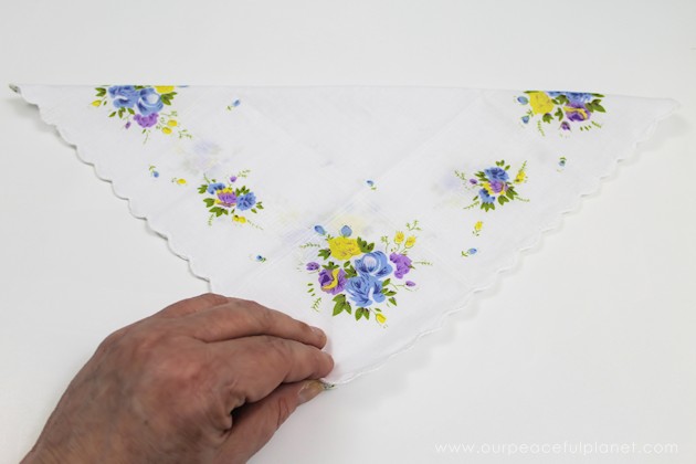 Give your friends a special Easter greetings bunny and beautiful poem made from a simple folded handkerchief or piece of cloth and filled with a golden egg.