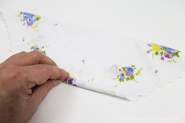 Give your friends a special Easter greetings bunny and beautiful poem made from a simple folded handkerchief or piece of cloth and filled with a golden egg.