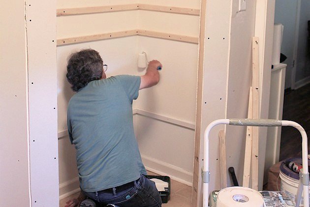 Add space and convenience to your small kitchen with this simple DIY pantry! It has floor to ceiling shelves, a door and it fits perfectly into a corner.