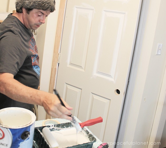 Add space and convenience to your small kitchen with this simple DIY pantry! It has floor to ceiling shelves, a door and it fits perfectly into a corner.