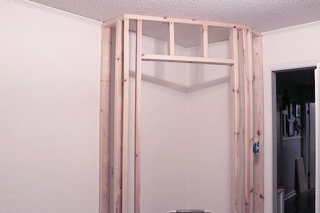 Add space and convenience to your small kitchen with this simple DIY pantry! It has floor to ceiling shelves, a door and it fits perfectly into a corner.