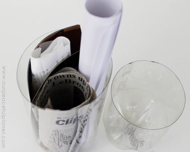 Make a fun family time capsule using plastic soda bottles and our free printables! We'll give you labels and ideas for other items to add into your capsule. 