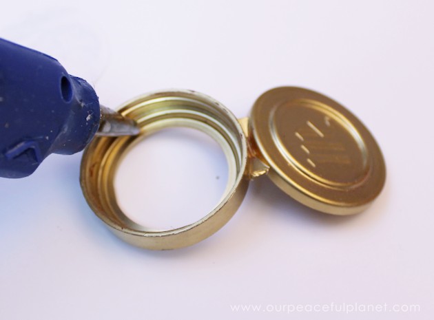 This cute upcycled locket necklace will put a grin on anyone's face and makes a wonderful gift for moms, grandmas or anyone who loves quirky jewelry.