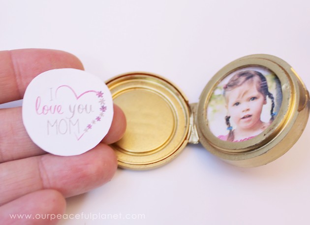 This cute upcycled locket necklace will put a grin on anyone's face and makes a wonderful gift for moms, grandmas or anyone who loves quirky jewelry.