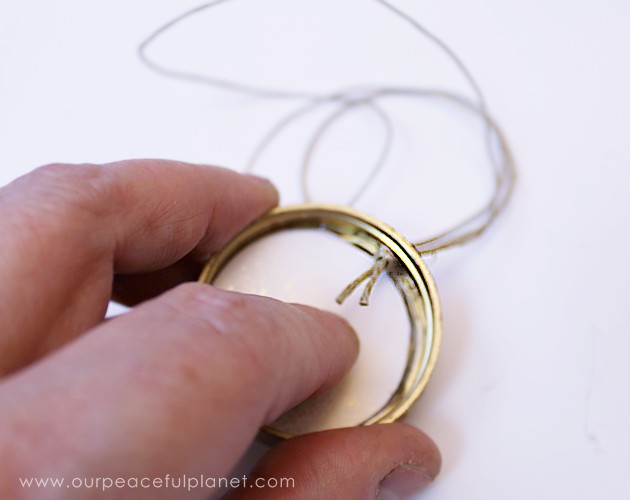 This cute upcycled locket necklace will put a grin on anyone's face and makes a wonderful gift for moms, grandmas or anyone who loves quirky jewelry.