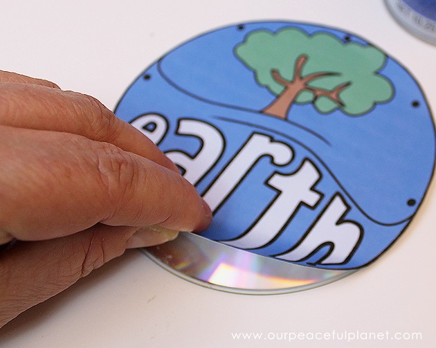 Make this awesome world clock for Earth Day or any day! It's made form a CD or DVD and we have free printable original artwork you can download.