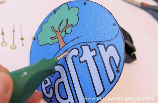 Make this awesome world clock for Earth Day or any day! It's made form a CD or DVD and we have free printable original artwork you can download.
