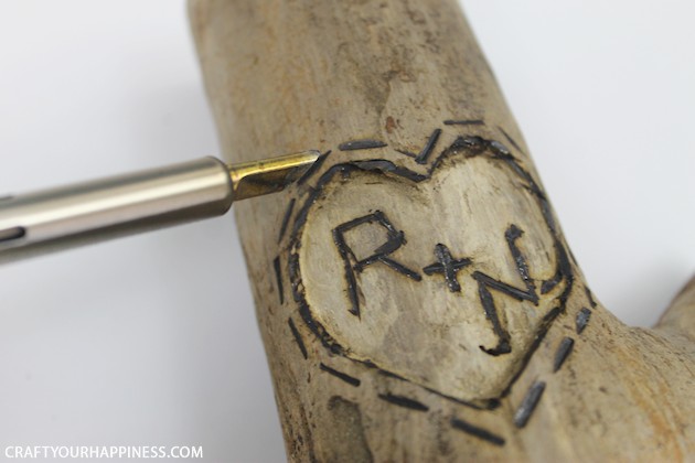 If you're looking for a unique gift idea for couples this darling carved sweetheart branch is perfect and inexpensive. You can make it with a couple of carving tools, which are cheap, and a marker. Or if you happen to own a rotary or Dremel tool and/or a wood burner, you can use those. We show both ways of making it.